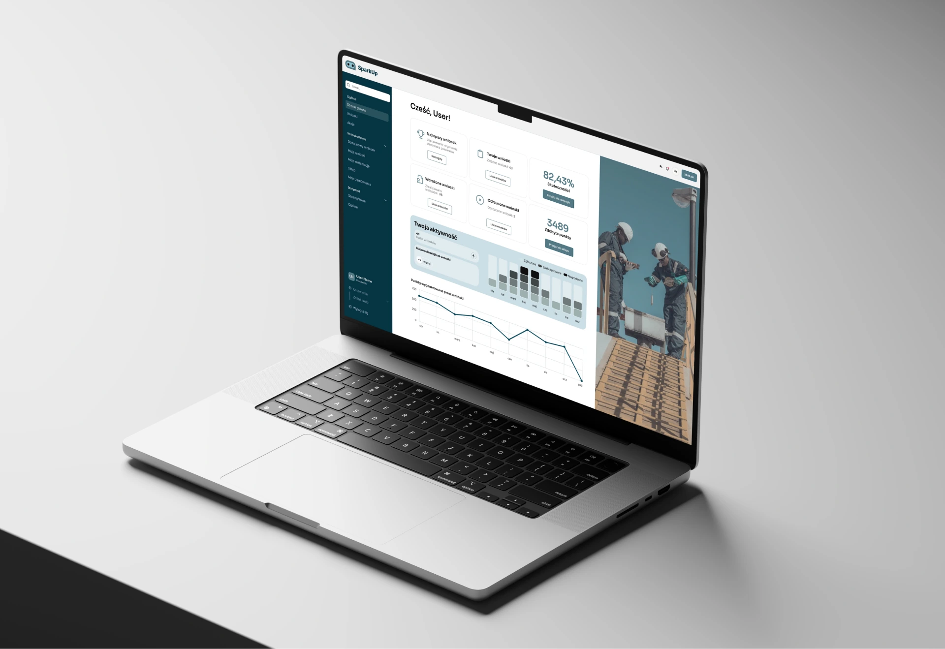 laptop on a desk with open application website